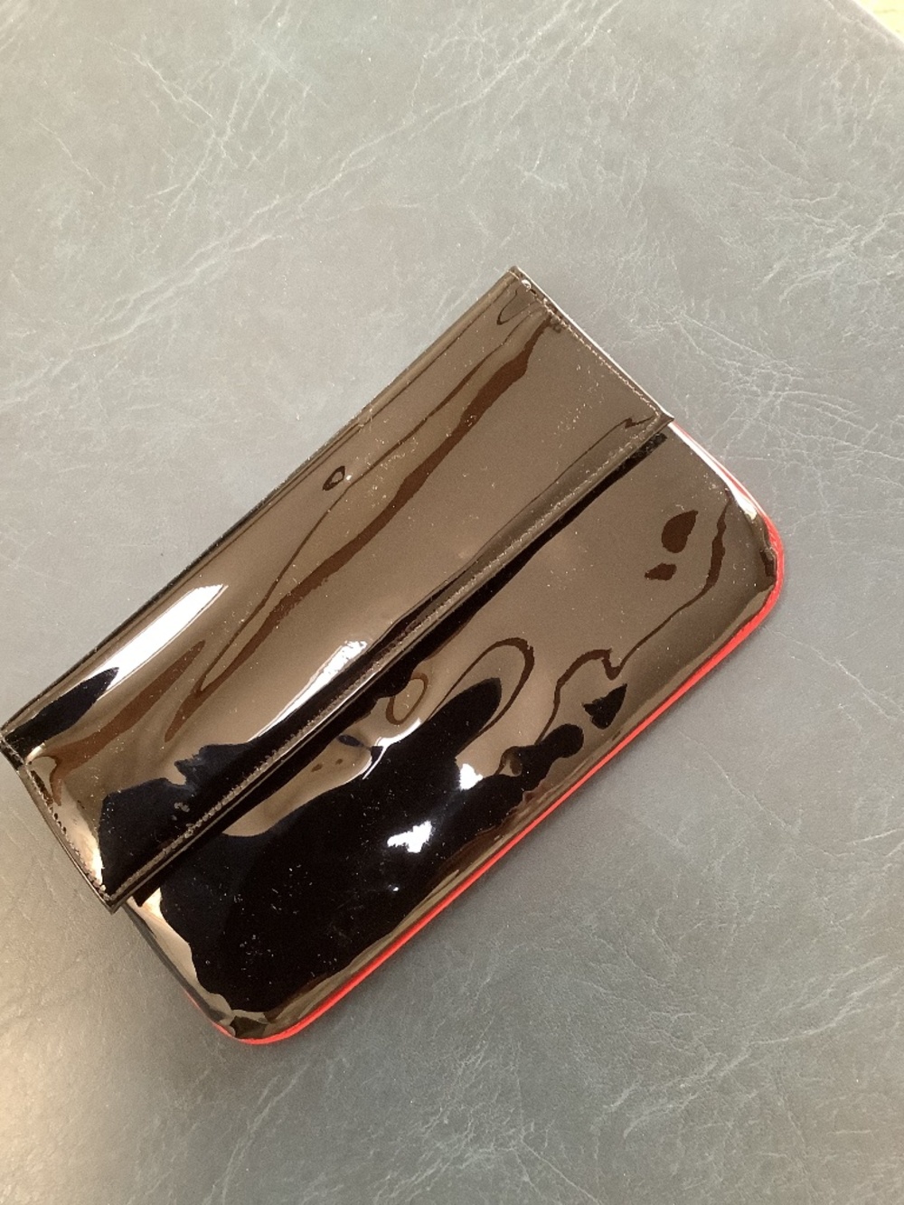 St Thomas patent-leather clutch/wallet. Black and red.